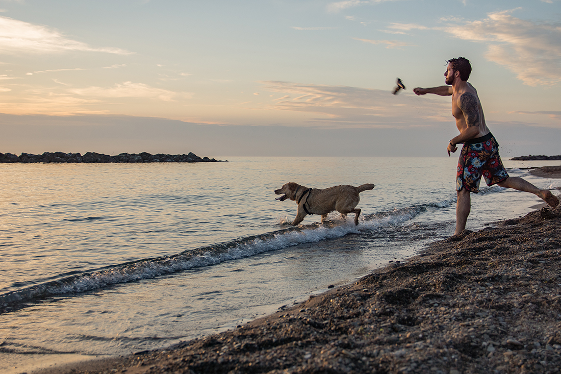 Matt and dog on beach